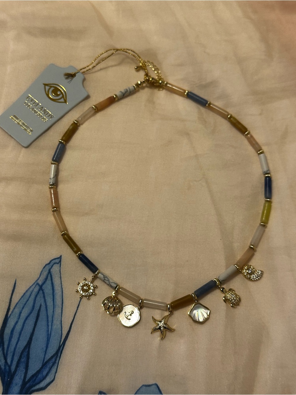 Eye Candy Los Angeles Gold Sea Charm Necklace with Blue, Gray and Tan Beads - Picture 6 of 7